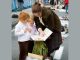 woman reading to children - FrankyDeMeyer/iStock/Getty Images