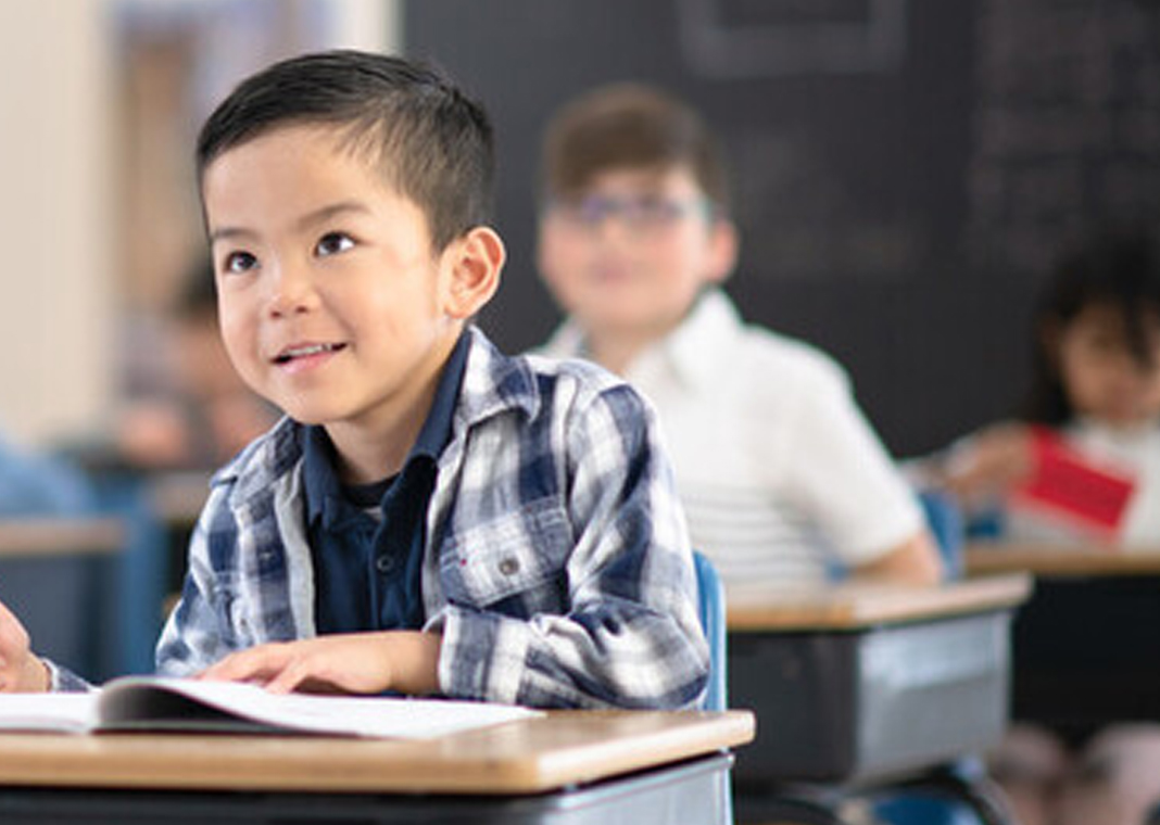 young boy in classroom - FatCamera/E+/Getty Images