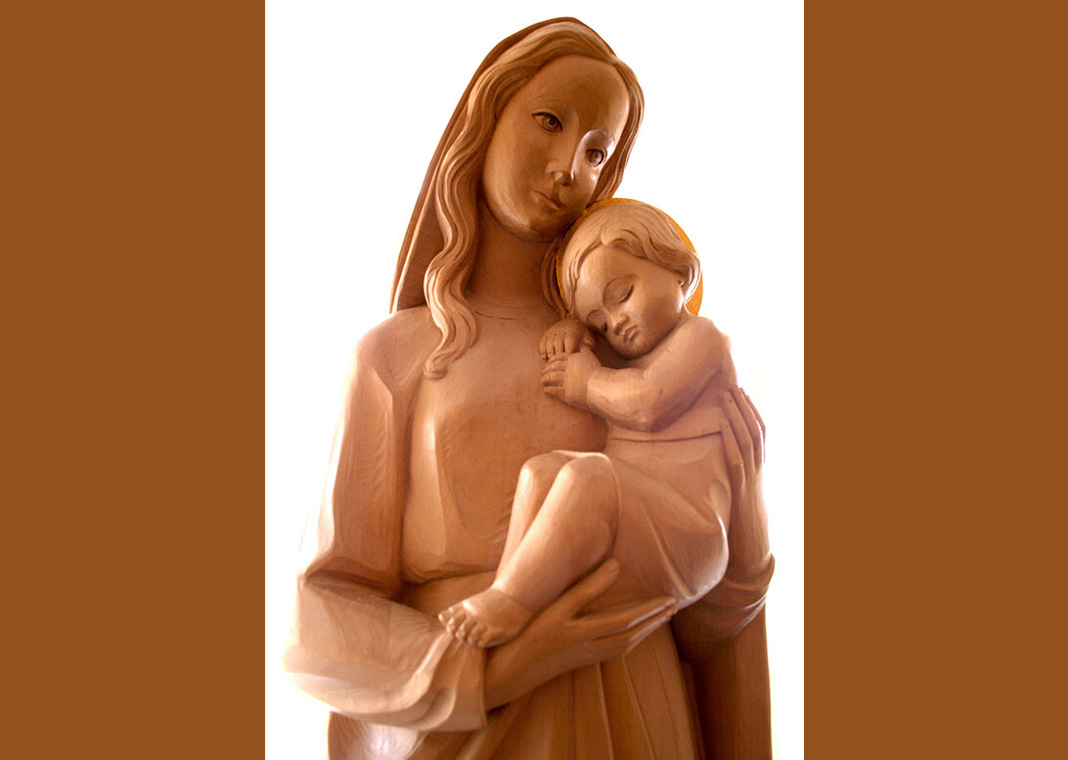 wooden statue of Mary with Child Jesus - sugapopcandy/iStock/Getty Images