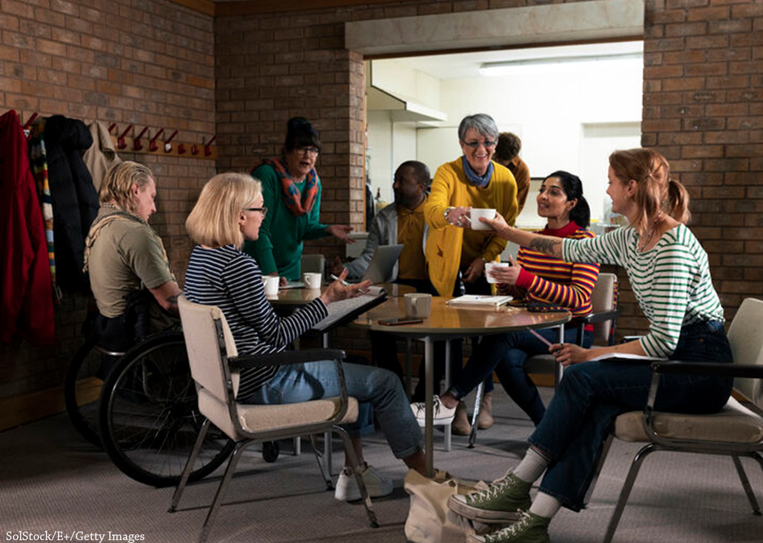 catechists meeting - sitting around table - (c) SolStock Ltd