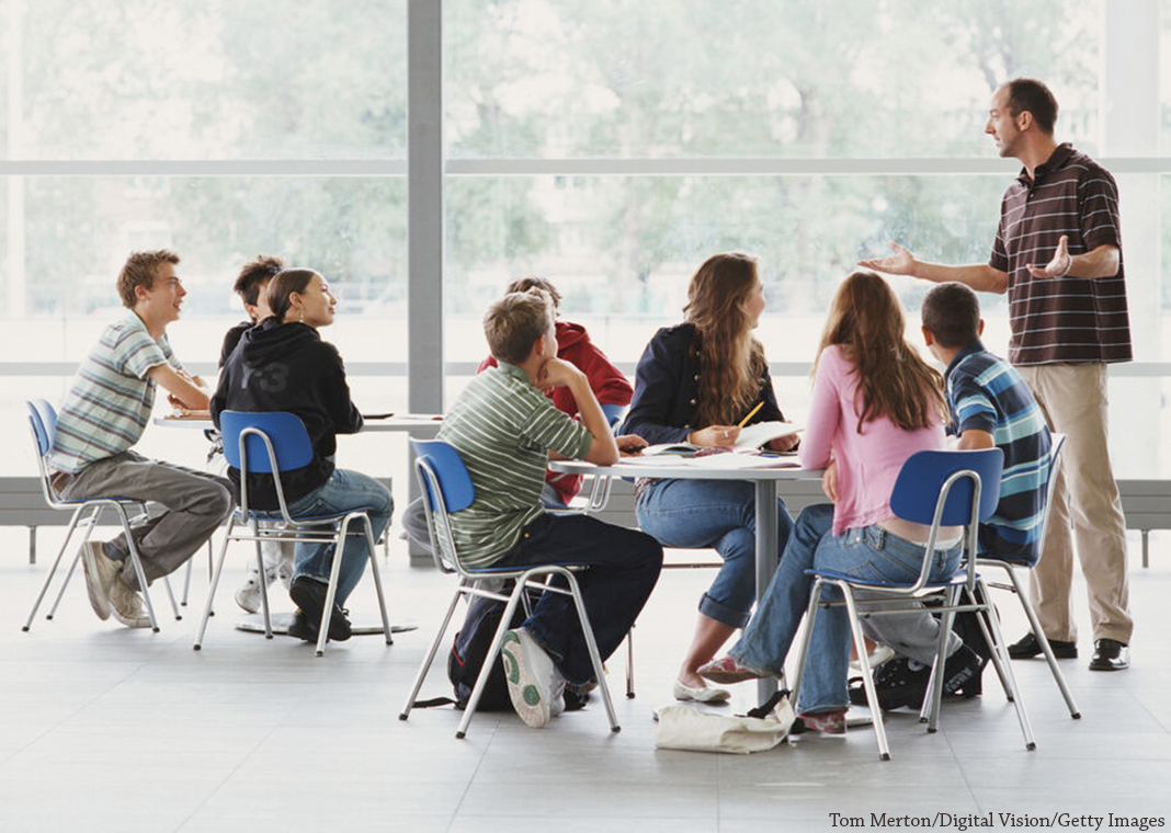 catechist teaching high school students - Tom Merton/Digital Vision/Getty Images