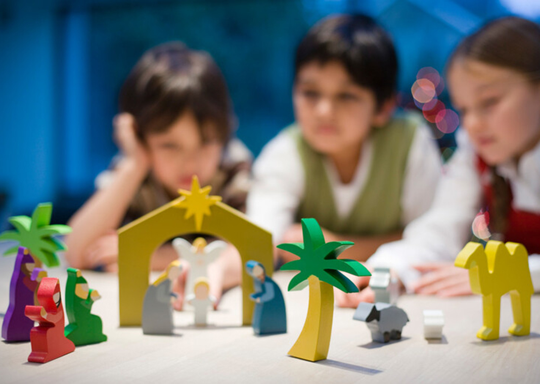 children with Nativity scene - Jupiterimages/Polka Dot/Getty Images