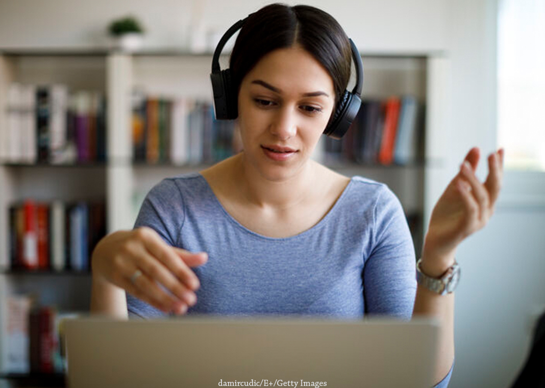 woman presenting on laptop - damircudic/E+/Getty Images
