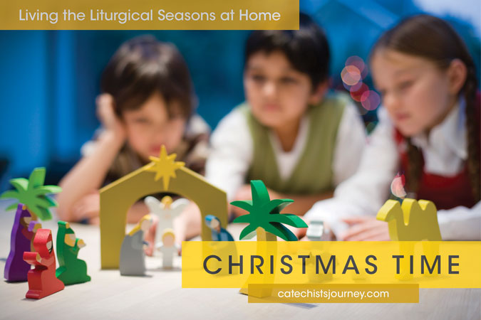 Living the Liturgical Seasons at Home - Christmas - children with Nativity scene