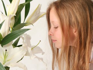 girl with Easter lilies