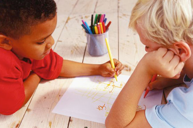 boys sharing crayons or markers