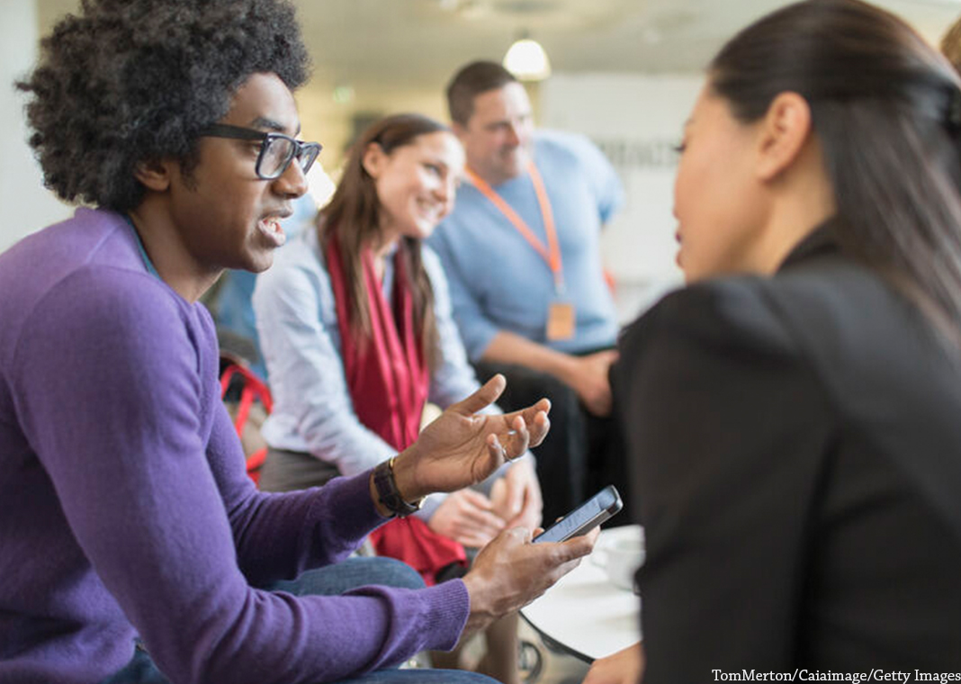 team having conversations - TomMerton/Caiaimage/Getty Images