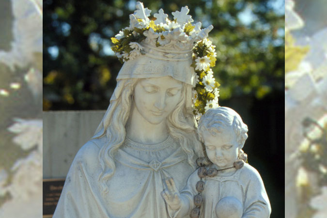 May Crowning - Mary statue with flowers