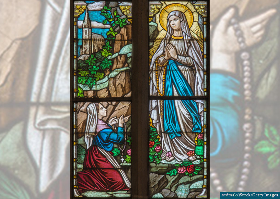 Our Lady of Lourdes and St. Bernadette Soubirous stained glass - sedmak/iStock/Getty Images
