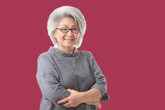 smiling Asian woman elder - kimberrywood/Shutterstock.com
