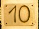 number 10 sign - photo by Timo Müller on Unsplash