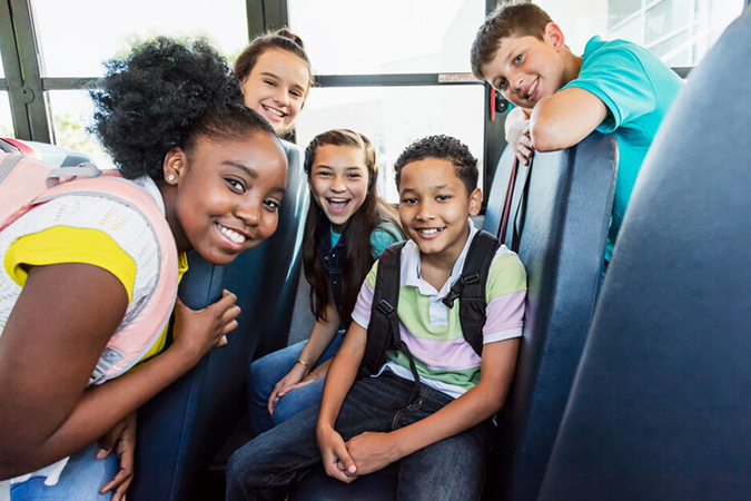 children on school bus - kali9/E+/Getty Images